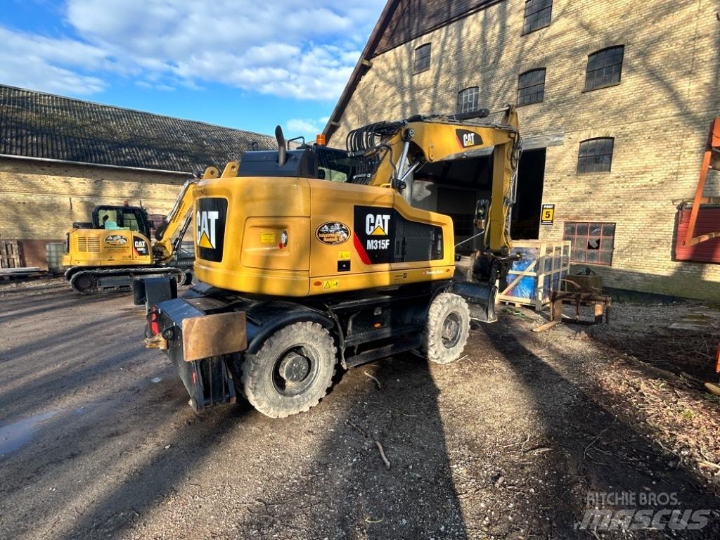 CAT M315 Lastik tekerli ekskavatörler