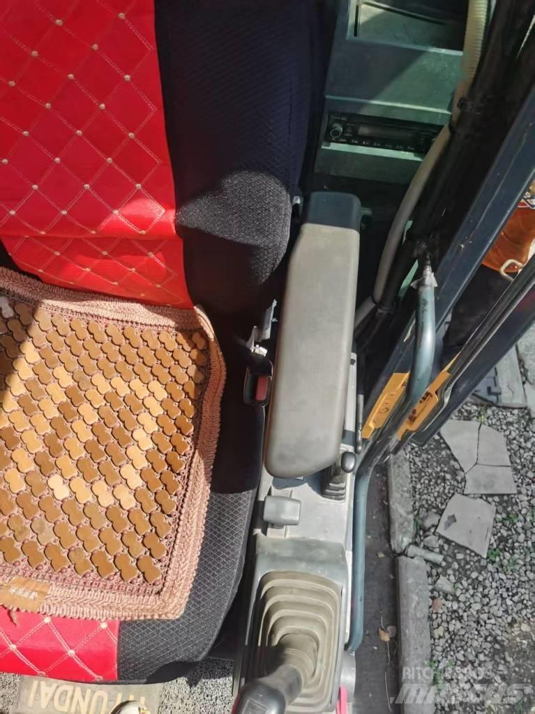 Hyundai 210w-9 Lastik tekerli ekskavatörler