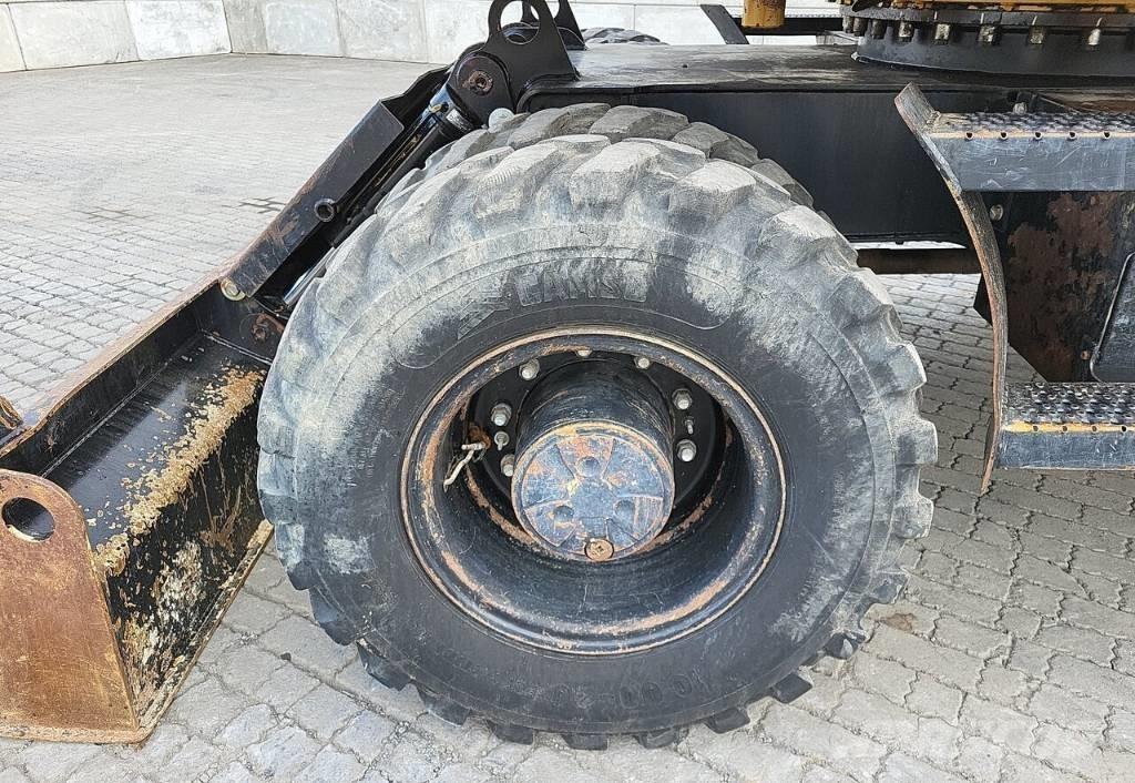 CAT M313 D Lastik tekerli ekskavatörler