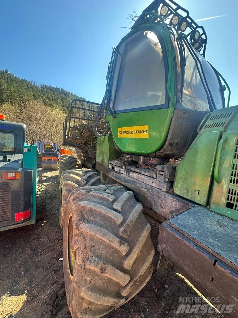 John Deere 810 E Tomruk yükleyici traktörler
