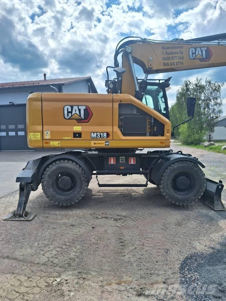 CAT M 318 Lastik tekerli ekskavatörler