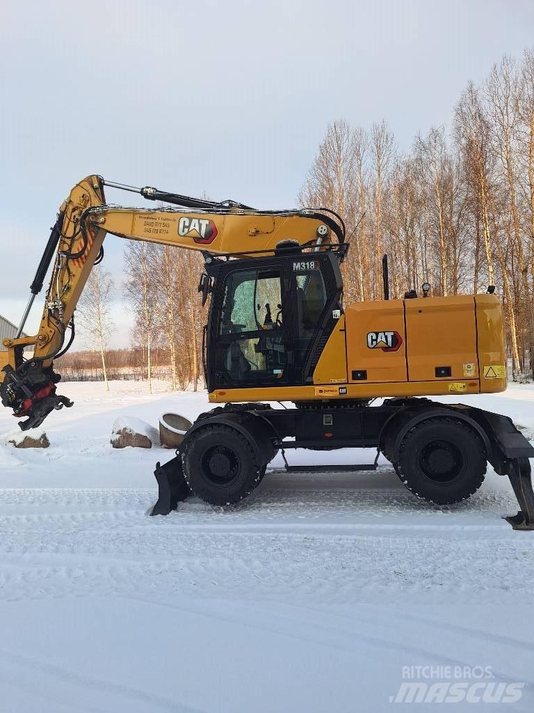 CAT M 318 Lastik tekerli ekskavatörler