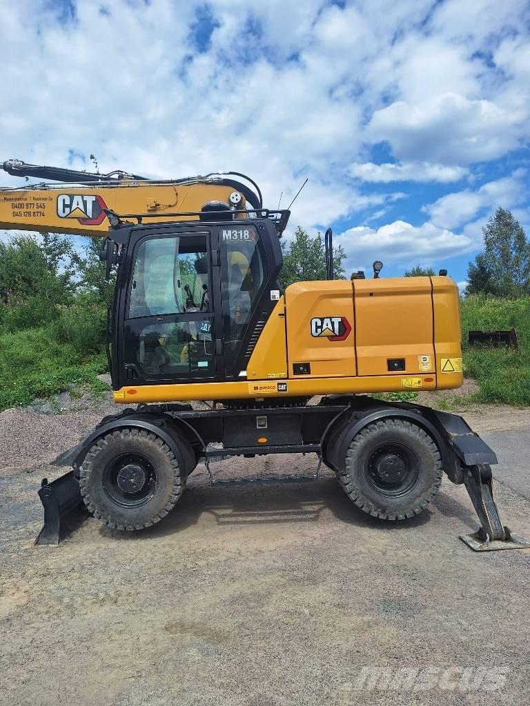 CAT M 318 Lastik tekerli ekskavatörler