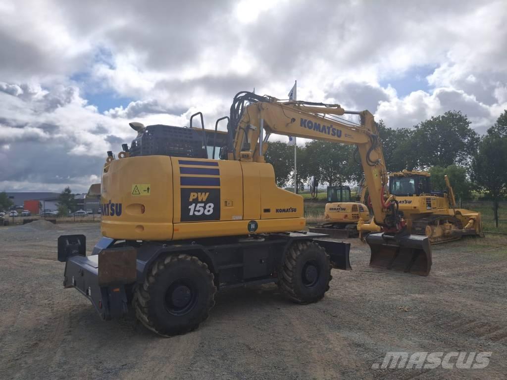 Komatsu PW158-11 Lastik tekerli ekskavatörler
