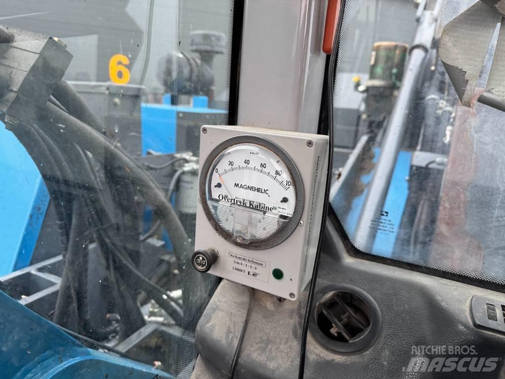 Fuchs MHL 320 Atık taşıma araçları