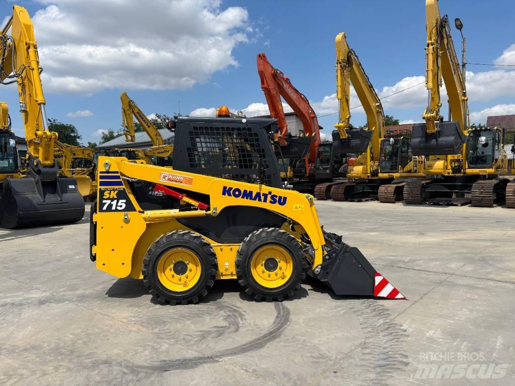 Komatsu SK 715-8 Skid steer loderler