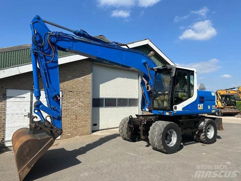 CAT M315 Lastik tekerli ekskavatörler