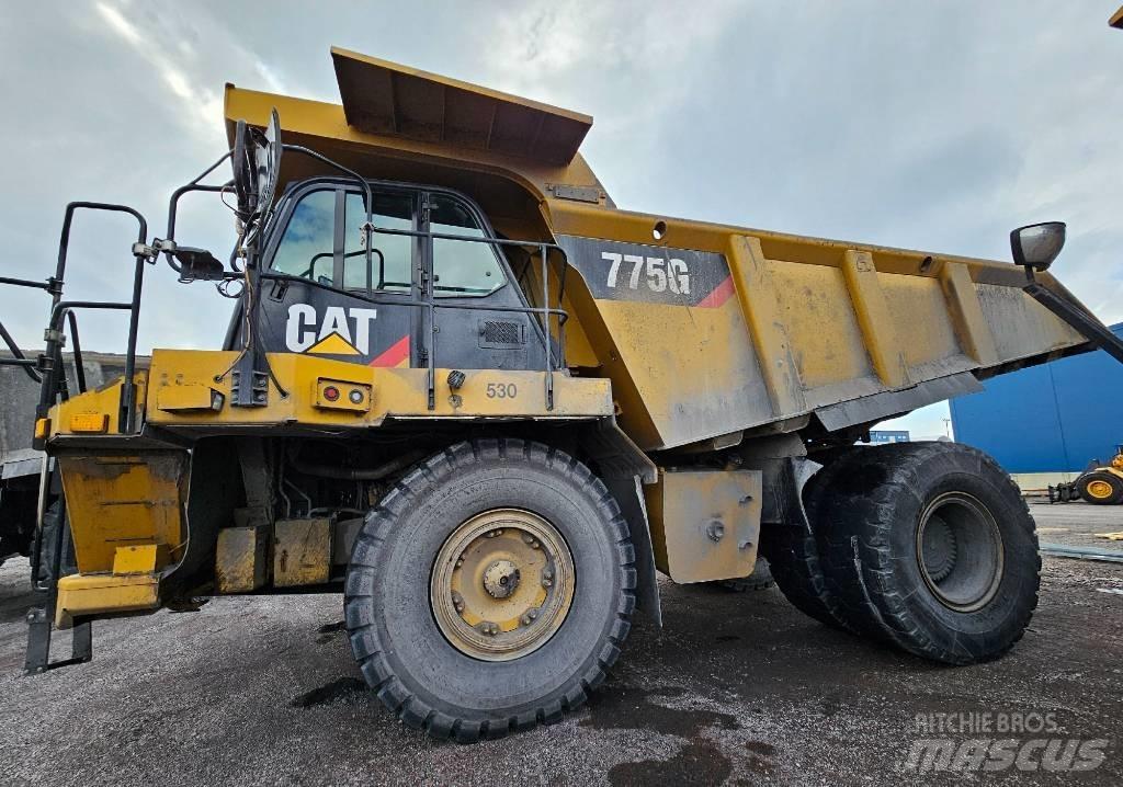 CAT 775 G Belden kirma kaya kamyonu