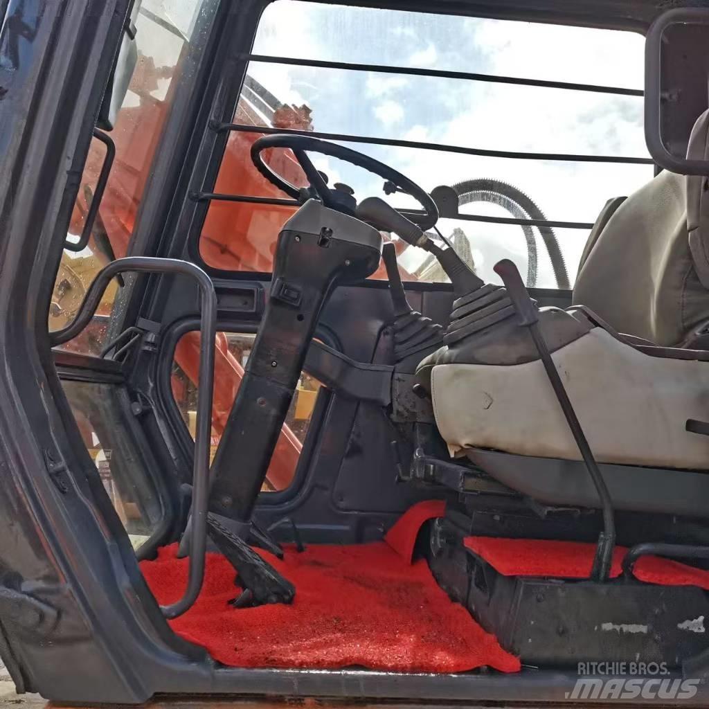 Hitachi EX 100 W D Lastik tekerli ekskavatörler