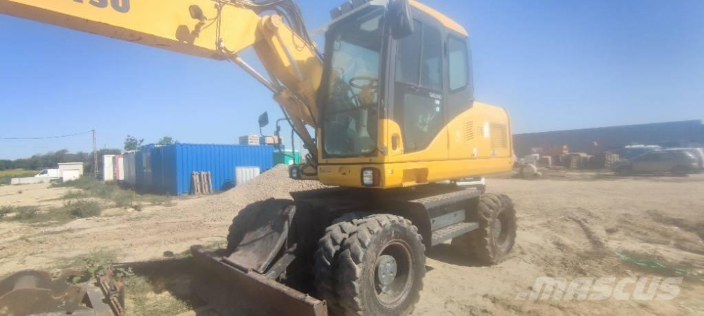 Komatsu PW 140-7 Lastik tekerli ekskavatörler