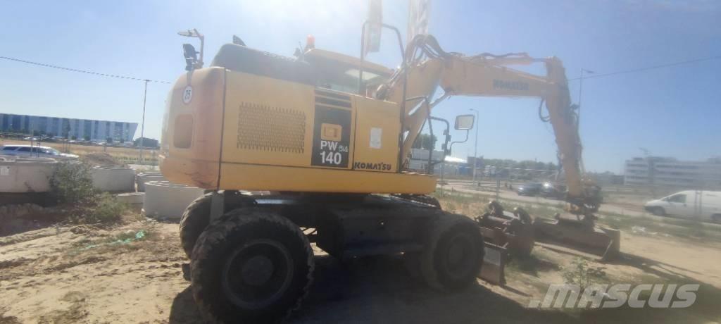 Komatsu PW 140-7 Lastik tekerli ekskavatörler