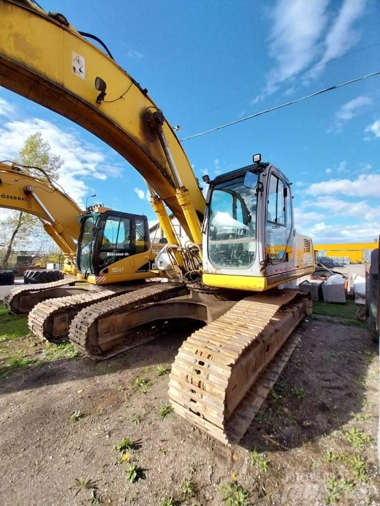 New Holland E 305 Paletli ekskavatörler
