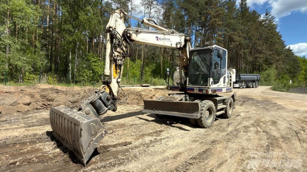 Komatsu PW 148-8 Lastik tekerli ekskavatörler