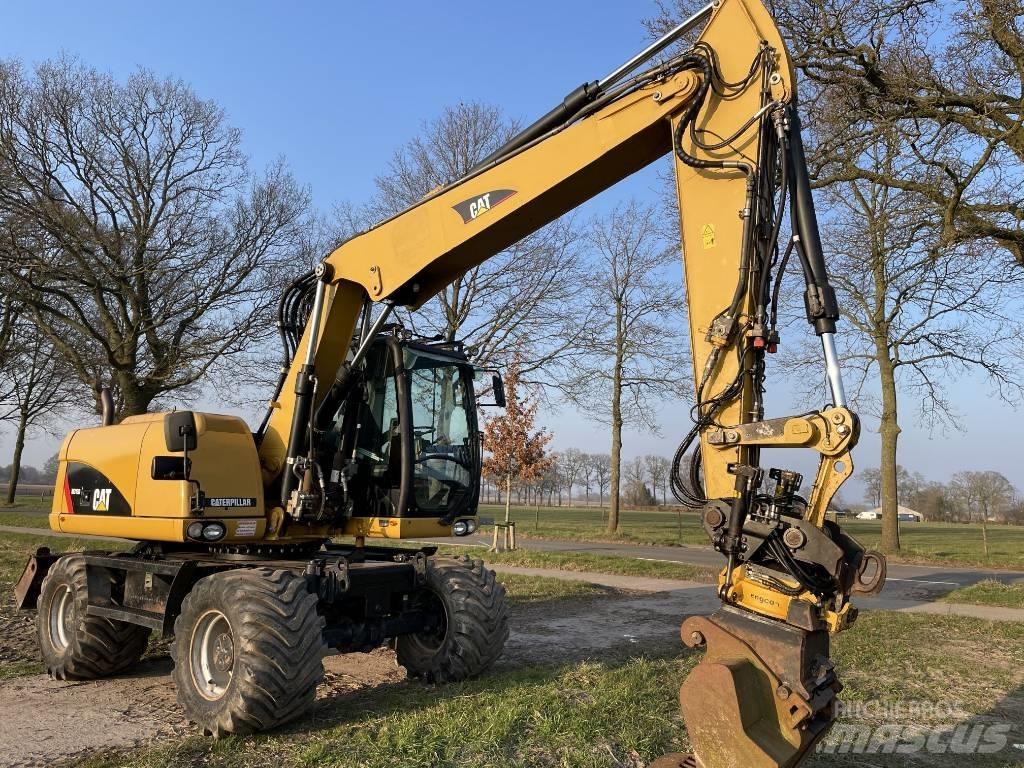 CAT M 313 D Lastik tekerli ekskavatörler