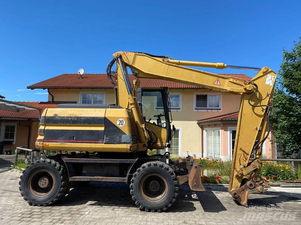 CAT M 312 Lastik tekerli ekskavatörler