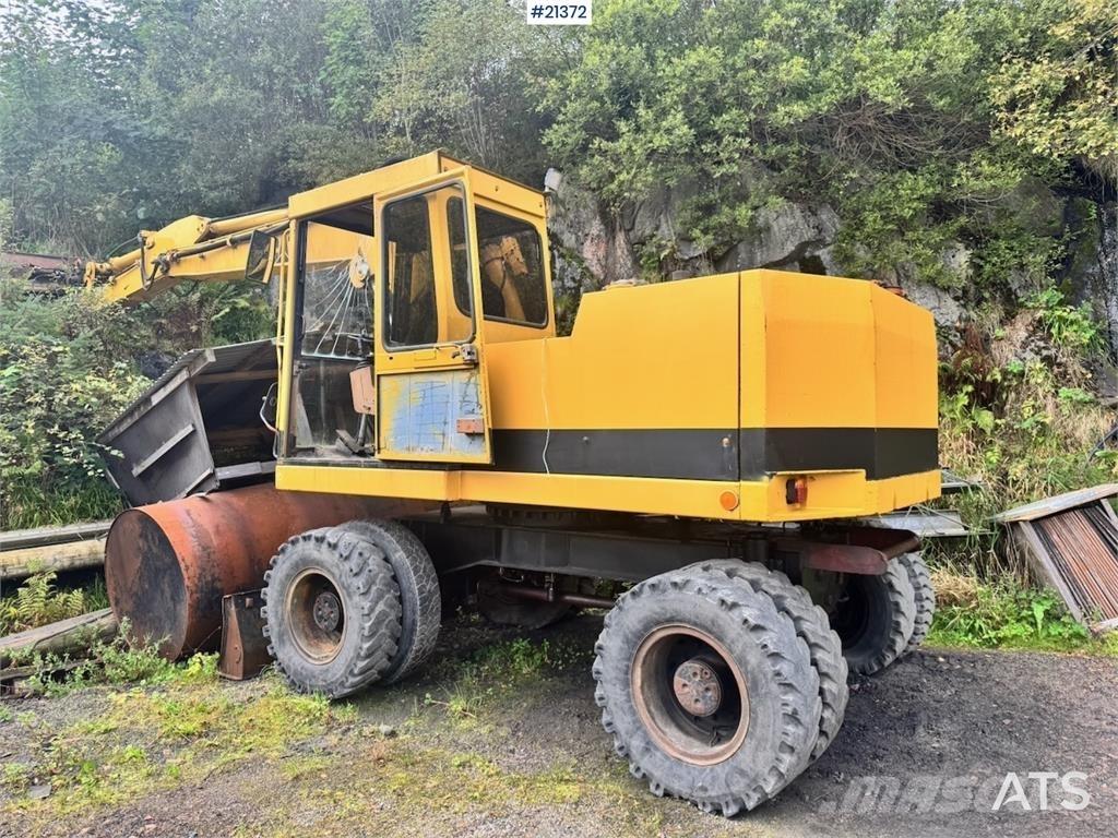CAT 212B Lastik tekerli ekskavatörler