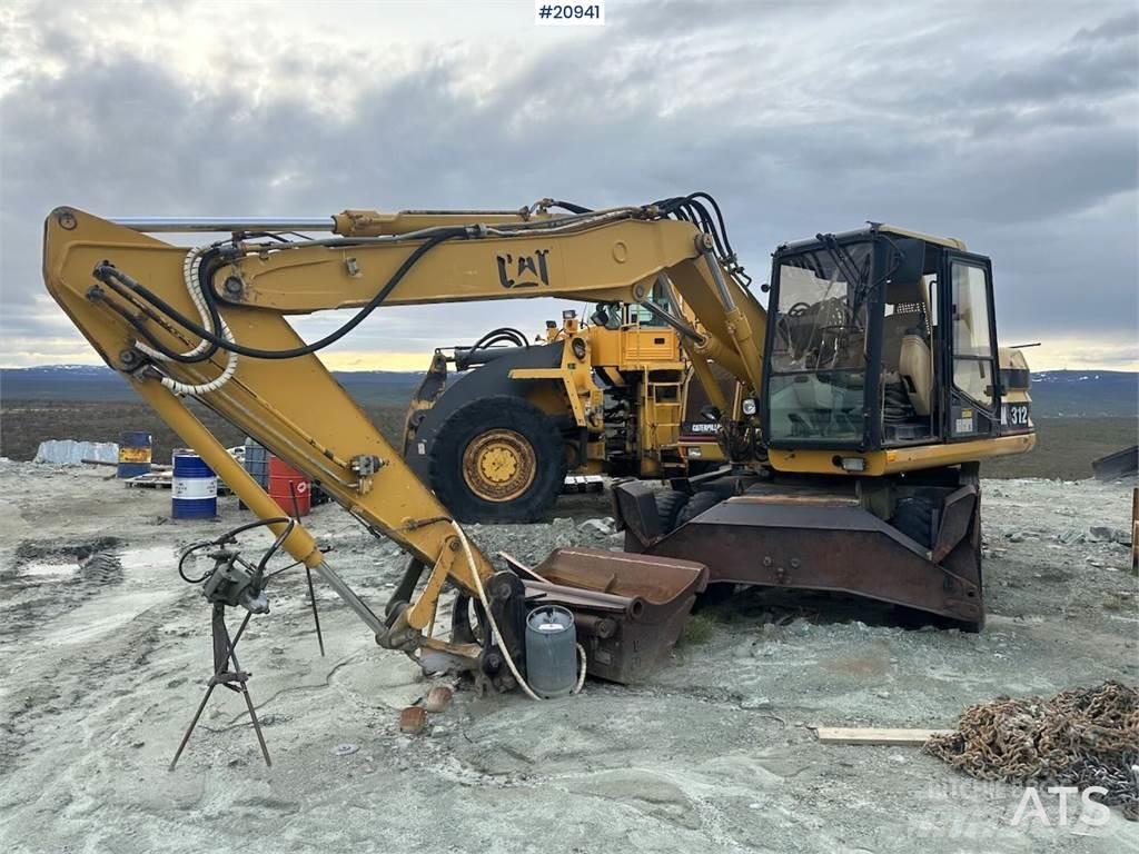 CAT 312 Lastik tekerli ekskavatörler
