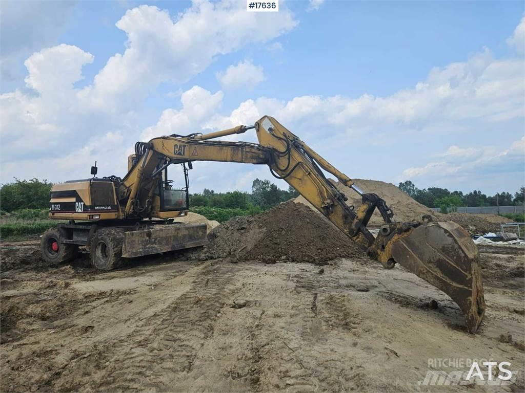 CAT M312 Lastik tekerli ekskavatörler