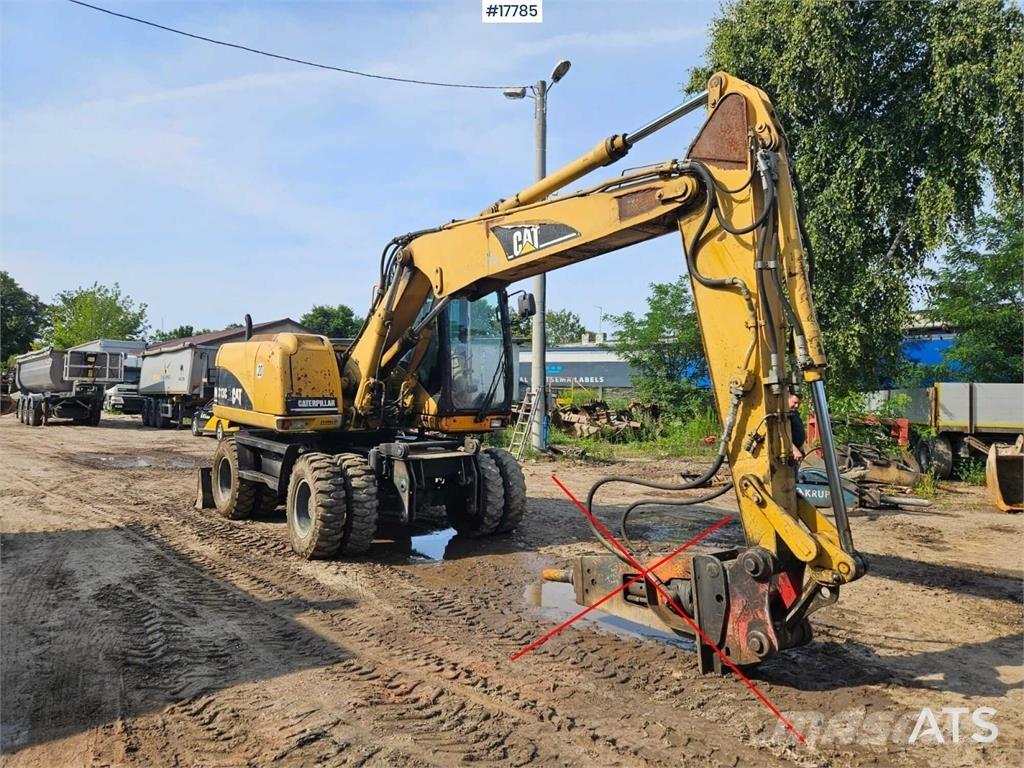 CAT M313 C Lastik tekerli ekskavatörler