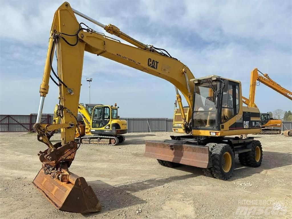 CAT M 315 Lastik tekerli ekskavatörler