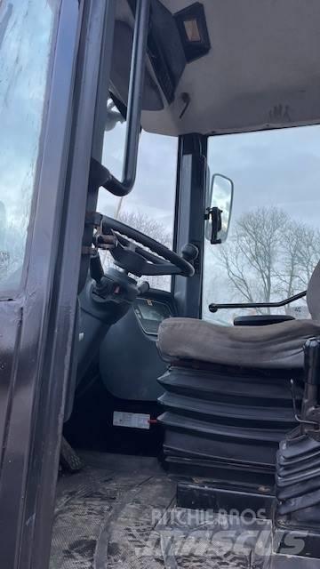 JCB 411 Tekerlekli yükleyiciler