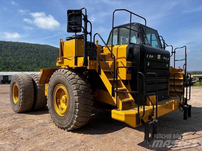 CAT 773G Belden kirma kaya kamyonu
