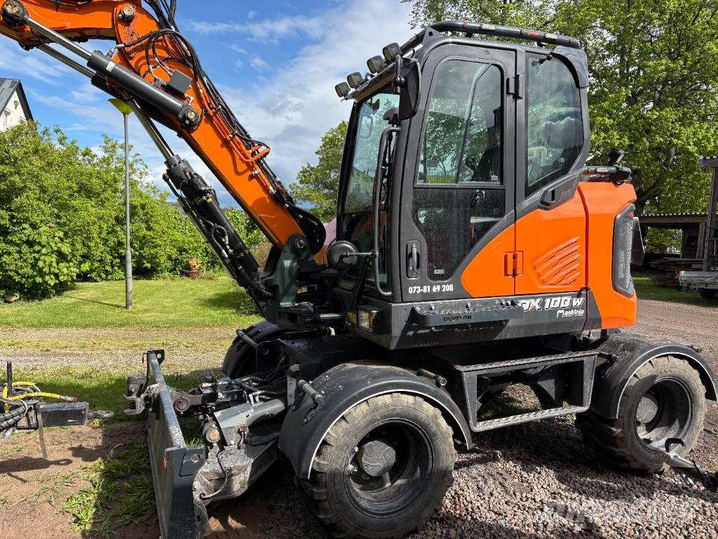 Develon DX 100 W-7 Lastik tekerli ekskavatörler