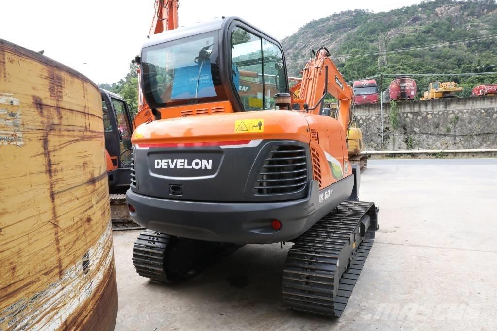 Develon DX 60 E-10 N Lastik tekerli ekskavatörler