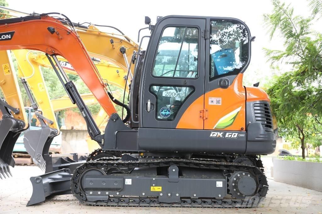 Develon DX 60 E-10 N Lastik tekerli ekskavatörler