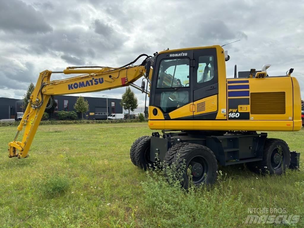 Komatsu PW160-11E0 Lastik tekerli ekskavatörler