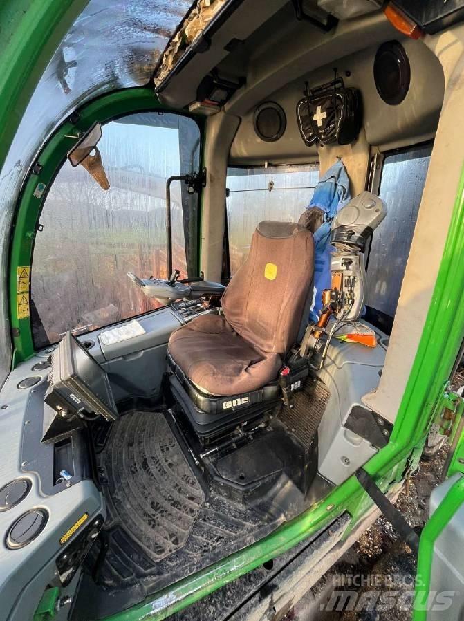 John Deere 1110 E Tomruk yükleyici traktörler
