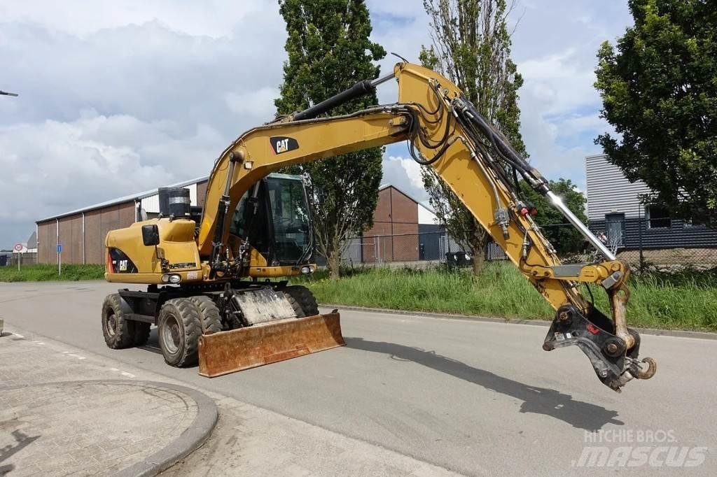 CAT M313 D Lastik tekerli ekskavatörler