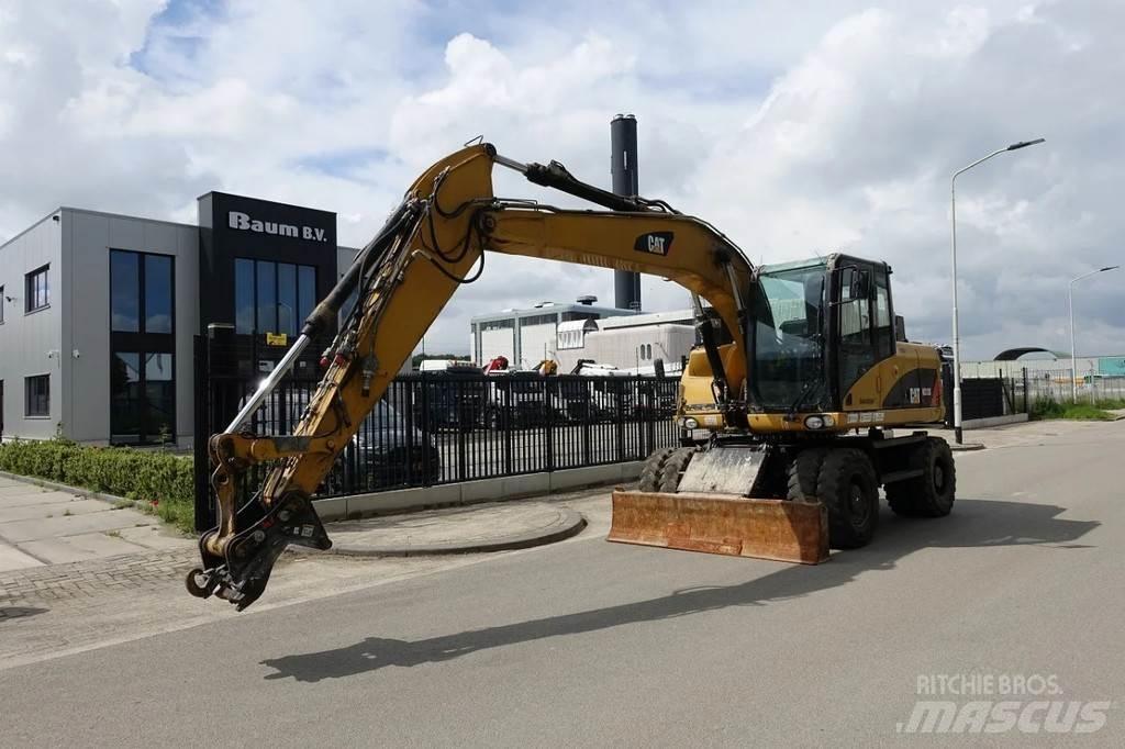 CAT M313 D Lastik tekerli ekskavatörler