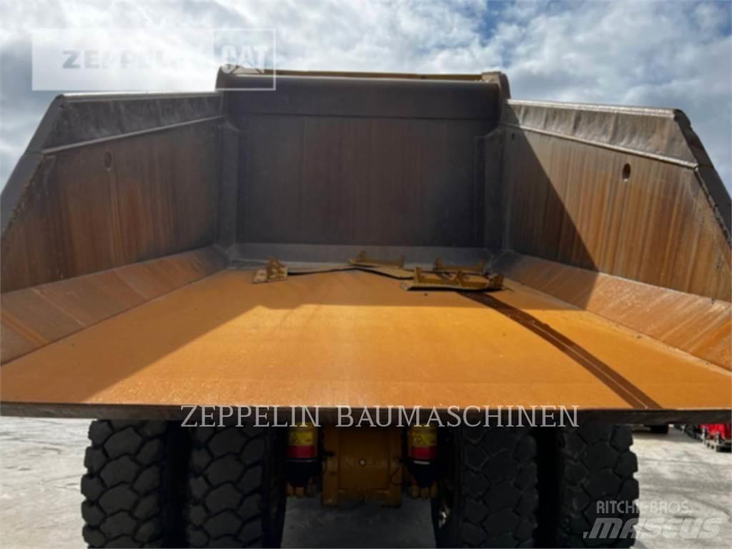 CAT 772G Belden kirma kaya kamyonu