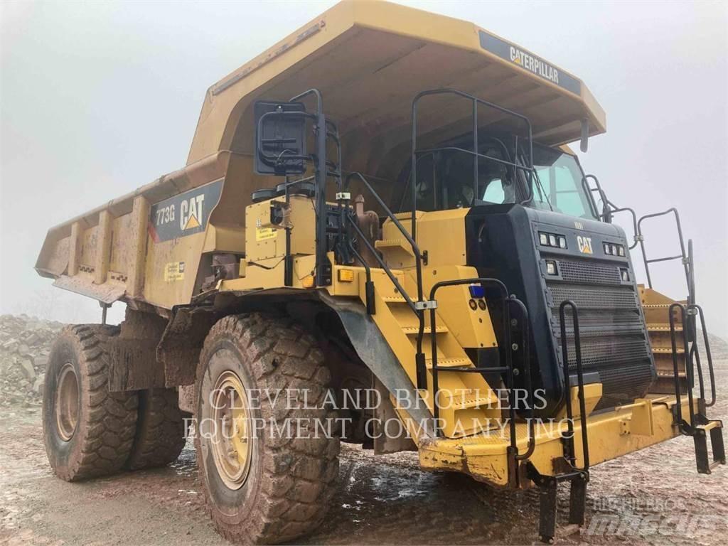 CAT 773G Belden kirma kaya kamyonu