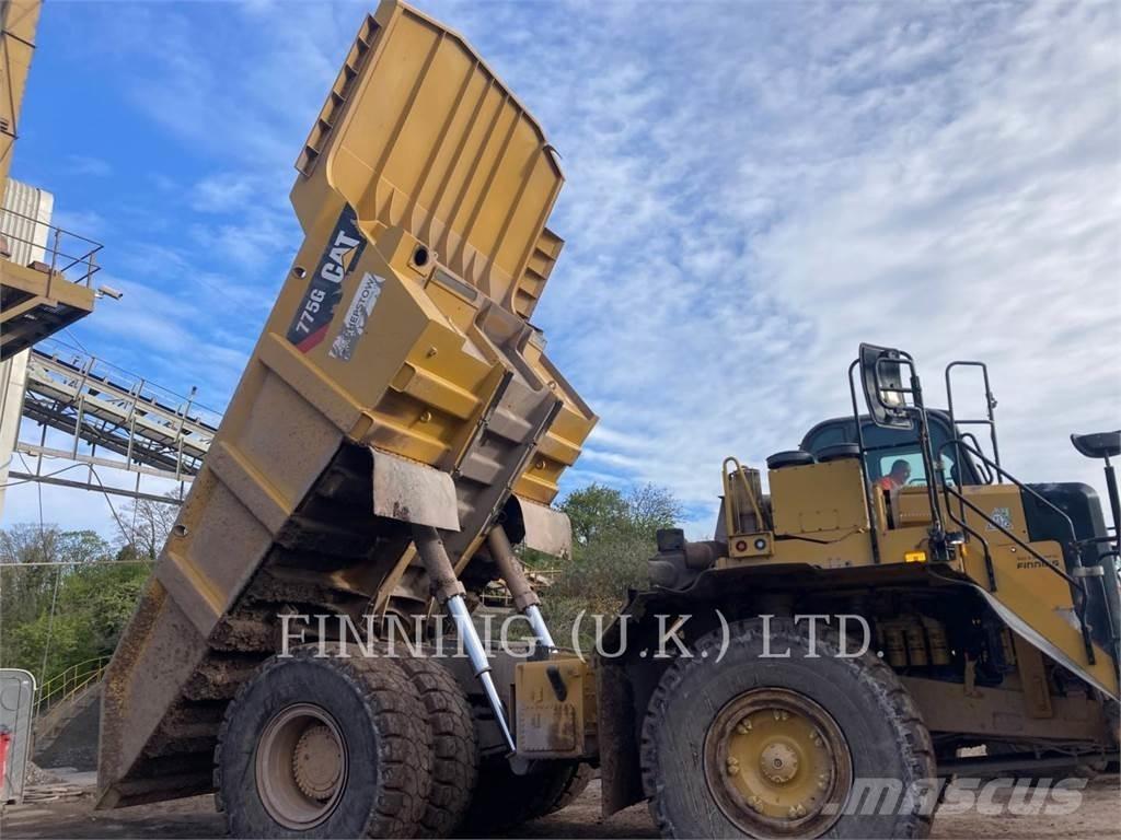 CAT 775G Belden kirma kaya kamyonu