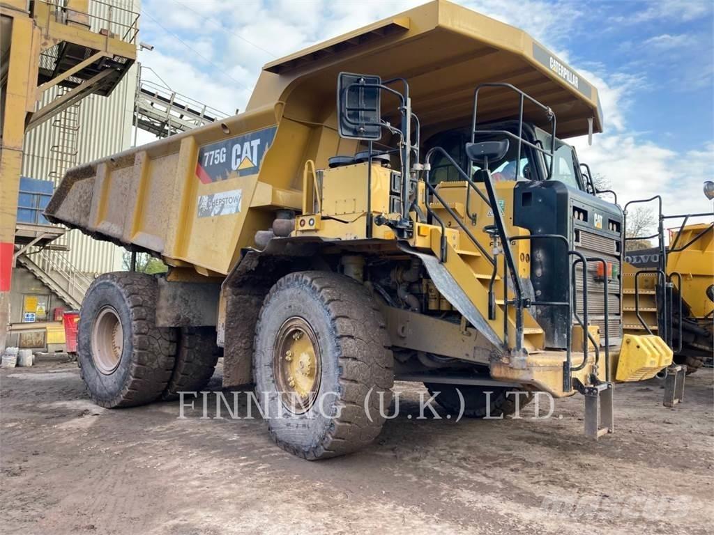 CAT 775G Belden kirma kaya kamyonu