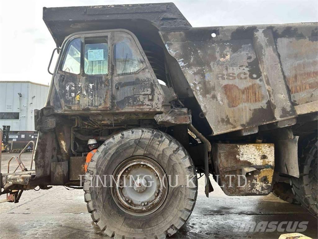 CAT 775G Belden kirma kaya kamyonu