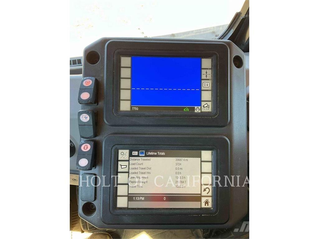 CAT 775G Belden kirma kaya kamyonu