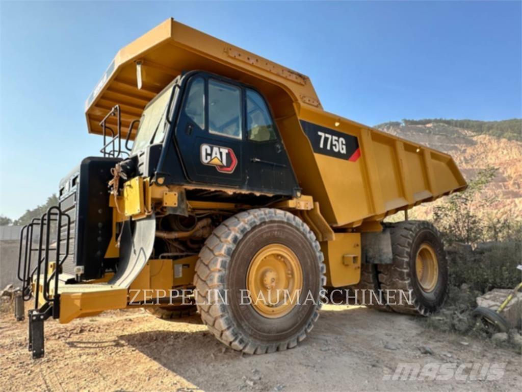 CAT 775G Belden kirma kaya kamyonu