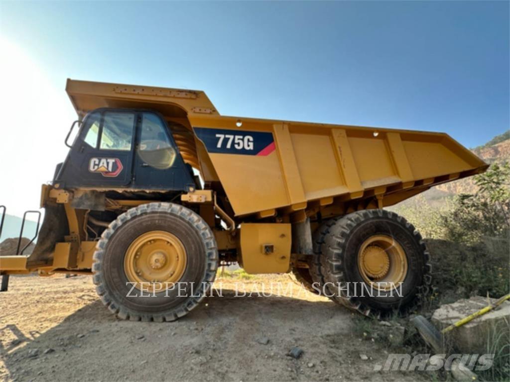 CAT 775G Belden kirma kaya kamyonu