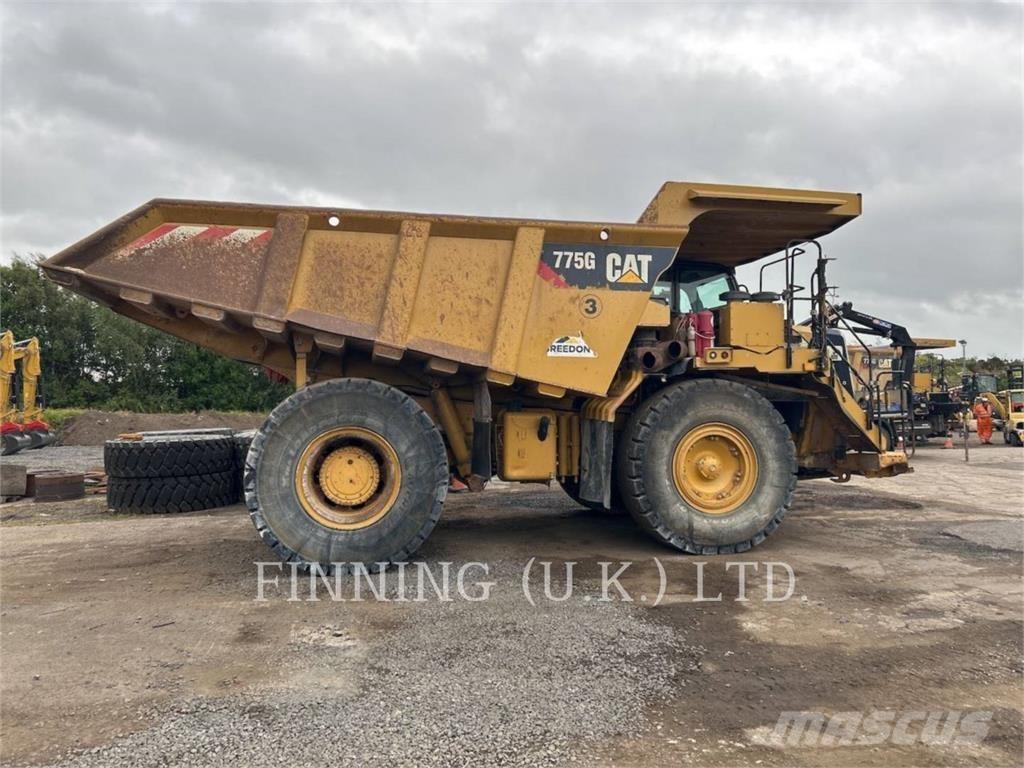 CAT 775G Belden kirma kaya kamyonu