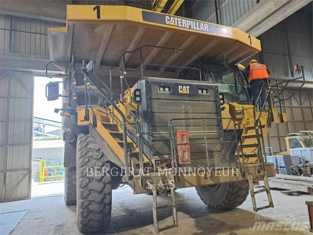 CAT 777G Belden kirma kaya kamyonu