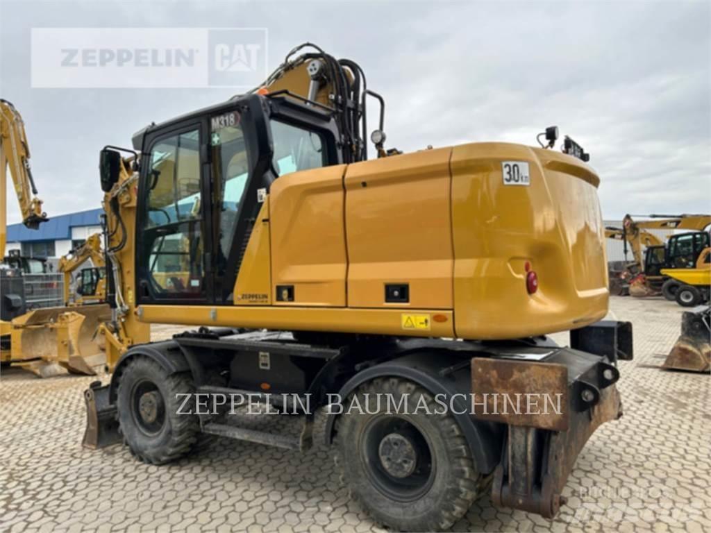 CAT M318-07A Lastik tekerli ekskavatörler