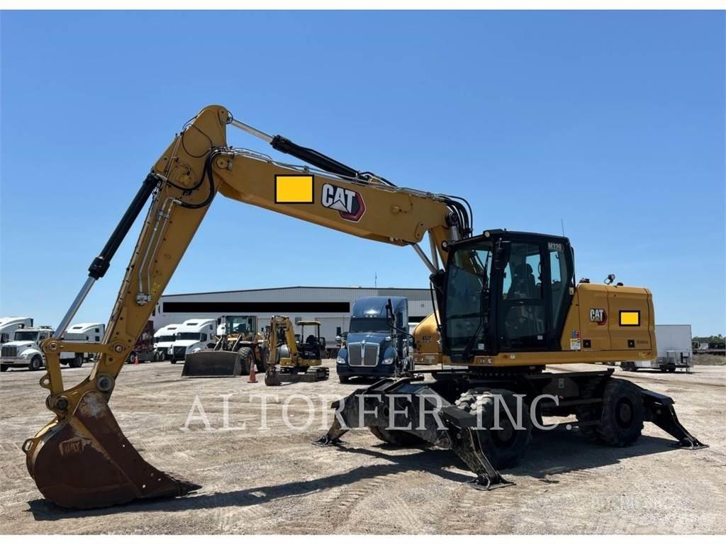 CAT M320 Lastik tekerli ekskavatörler
