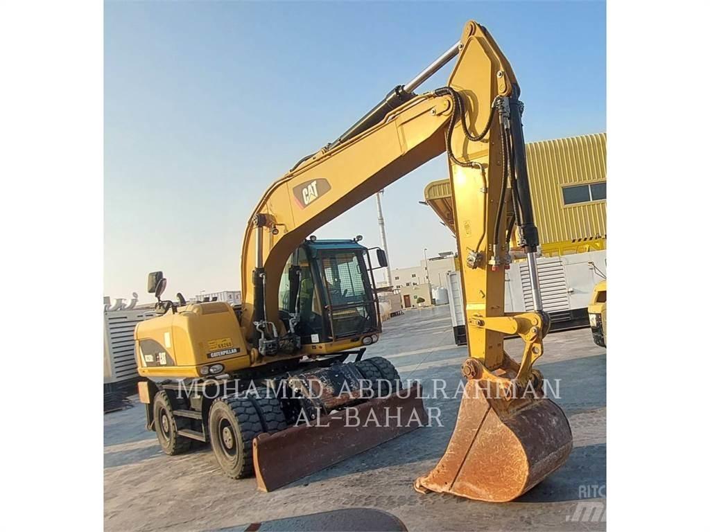 CAT M320D2 Lastik tekerli ekskavatörler