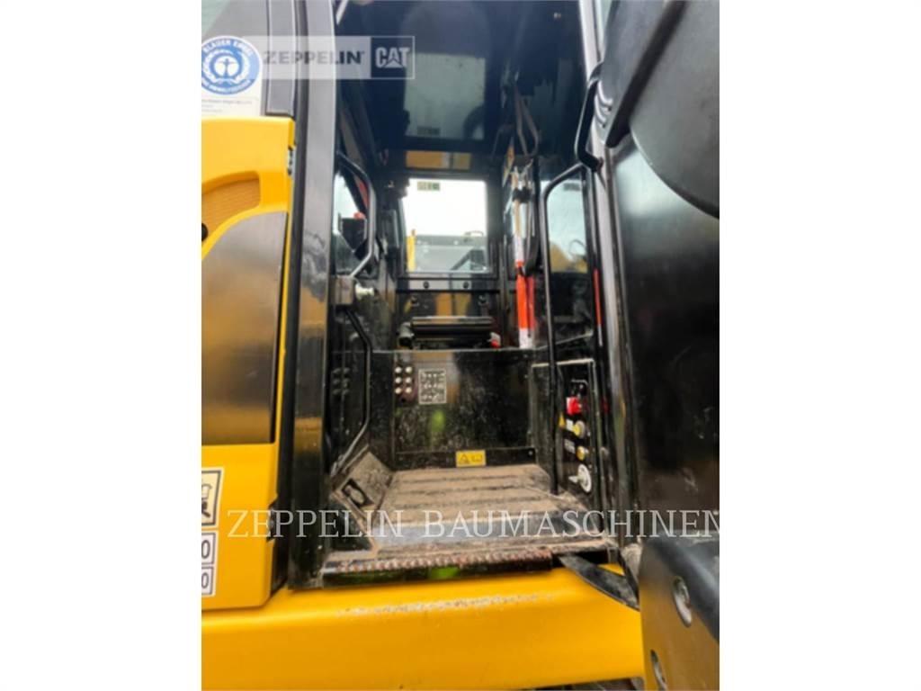 CAT M323F Lastik tekerli ekskavatörler