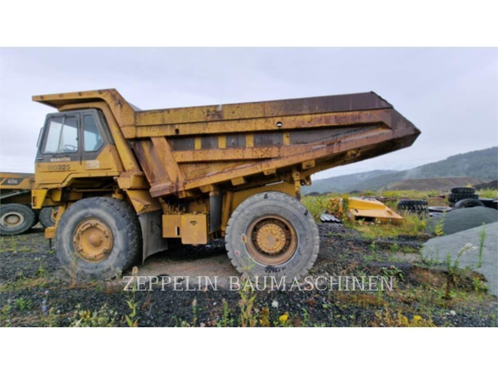 Komatsu HD325-6 Belden kirma kaya kamyonu