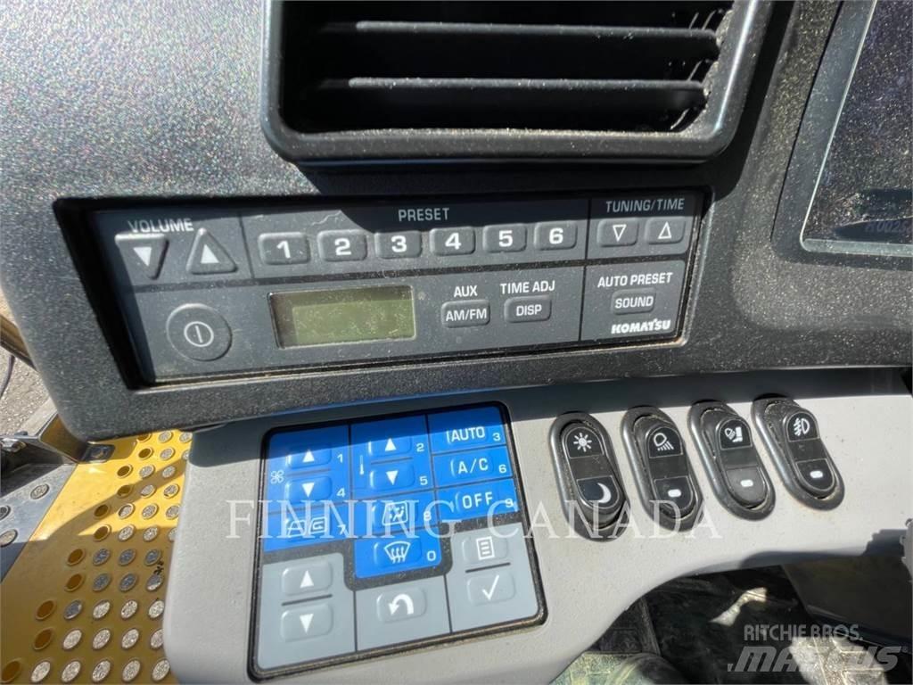 Komatsu HD605-8 Belden kirma kaya kamyonu