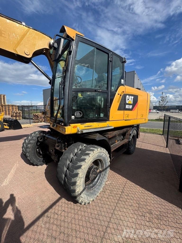 CAT 318 Lastik tekerli ekskavatörler